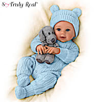 A Boy and His Dog… Snuggly baby doll cozied in a custom cable knit sleeper with his plush BFF